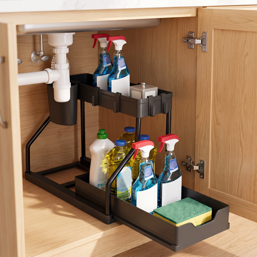 Black two-tier under-sink organizer holding cleaning bottles inside a kitchen cabinet