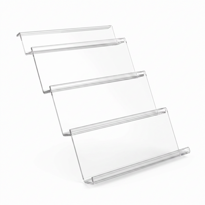 Clear four-tier expandable spice drawer organizer on a white background