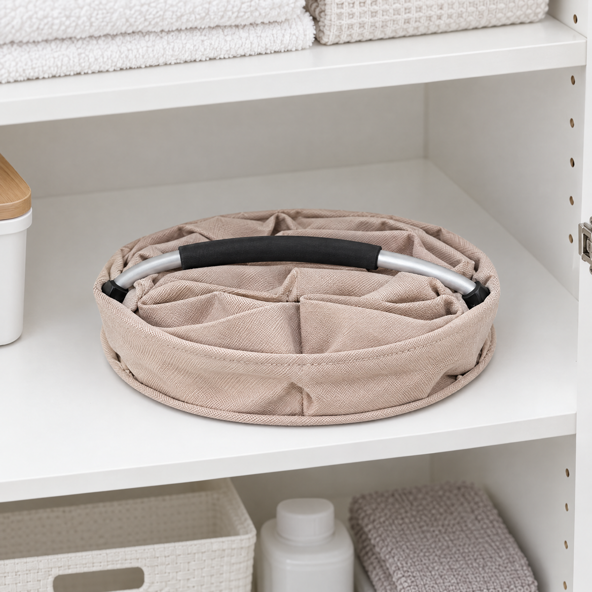 Beige cleaning caddy folded flat with its handle down, stored on a cupboard shelf