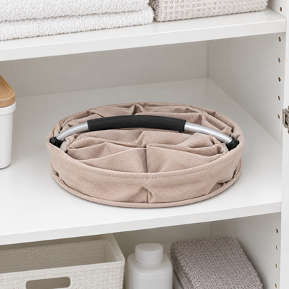 Beige cleaning caddy folded flat with its handle down, stored on a cupboard shelf