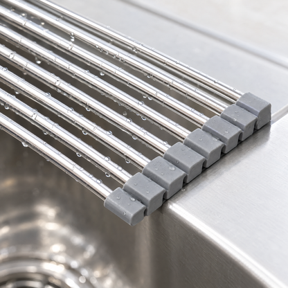 Close-up of the stainless-steel rods and grey end pieces resting on the edge of a sink