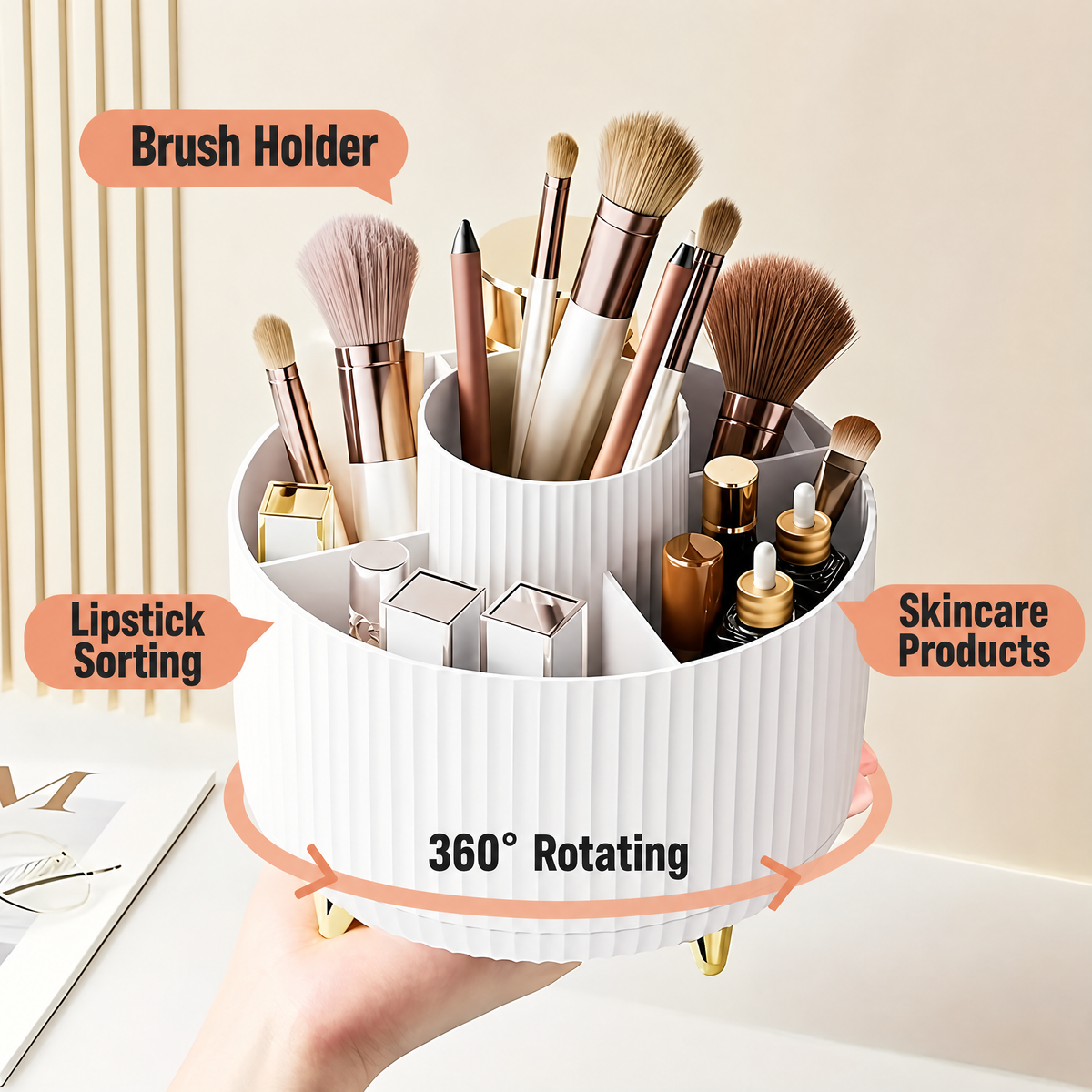 White rotating makeup organizer held in hand with brushes in the center cup, lipsticks and skincare in the side compartments, turning 360 degrees