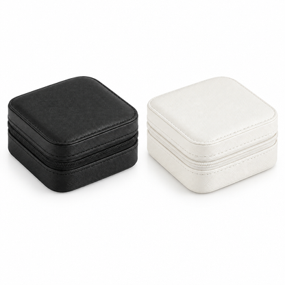 Black and white small zippered travel jewelry cases, closed